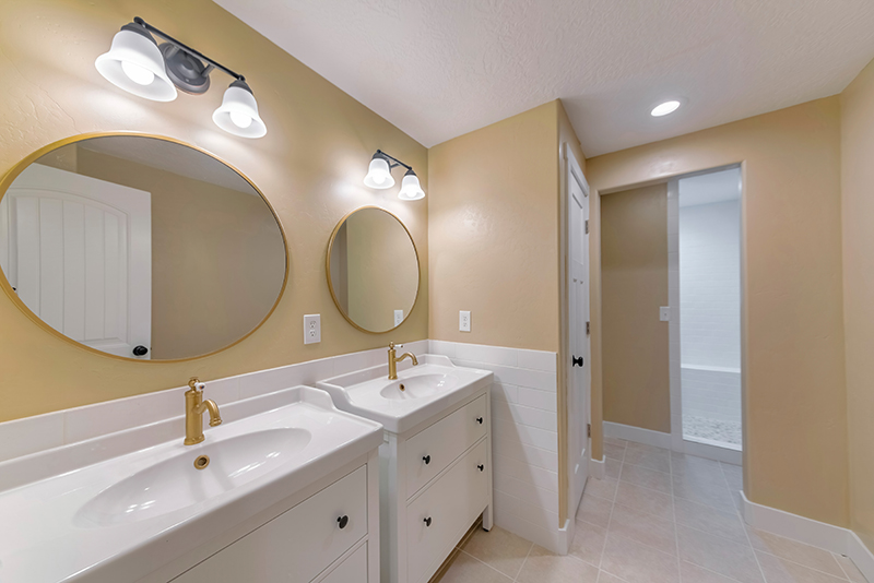 Mirrors and two sinks in a bathroom Solar Leads with Adsurdly